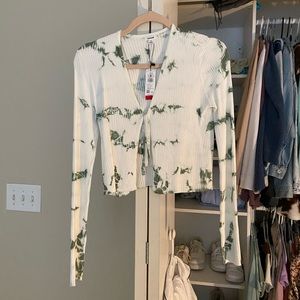 Slightly cropped white sweater